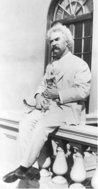 Mark Twain con uno dei suoi gatti