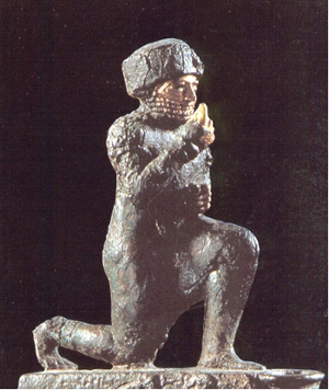 13 Statuetta in bronzo, XX secolo a.C., Museo del Louvre, Parigi